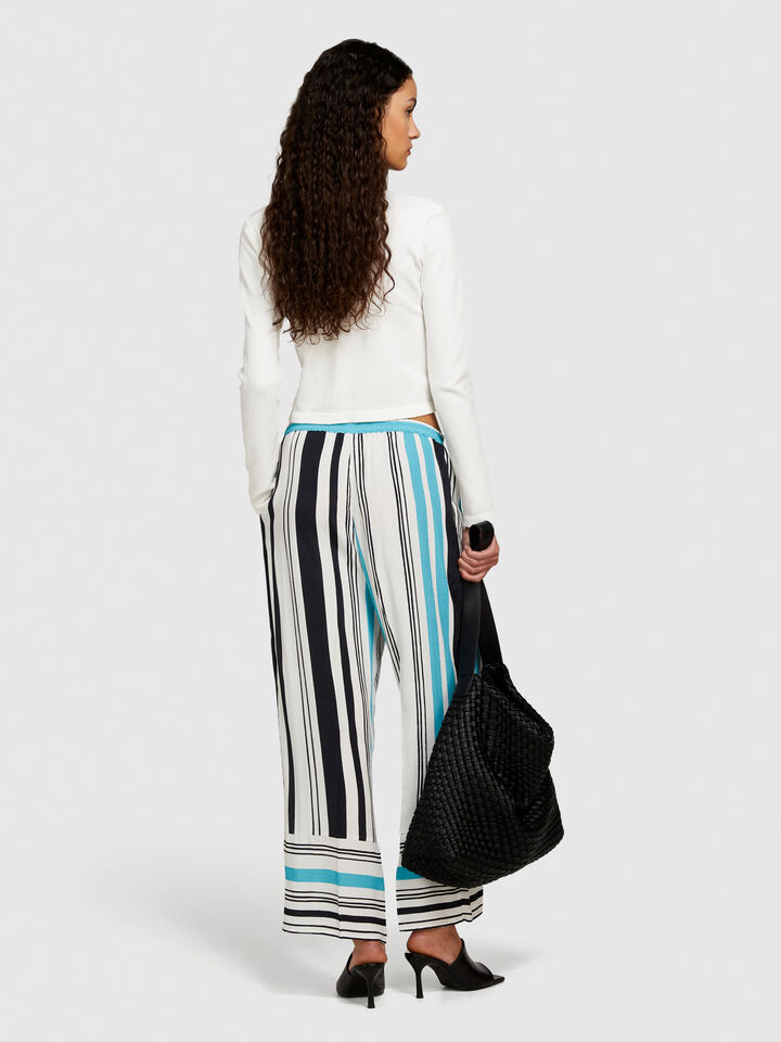 Printed satin trousers - women's flared trousers - Multi-color | Sisley image number 3